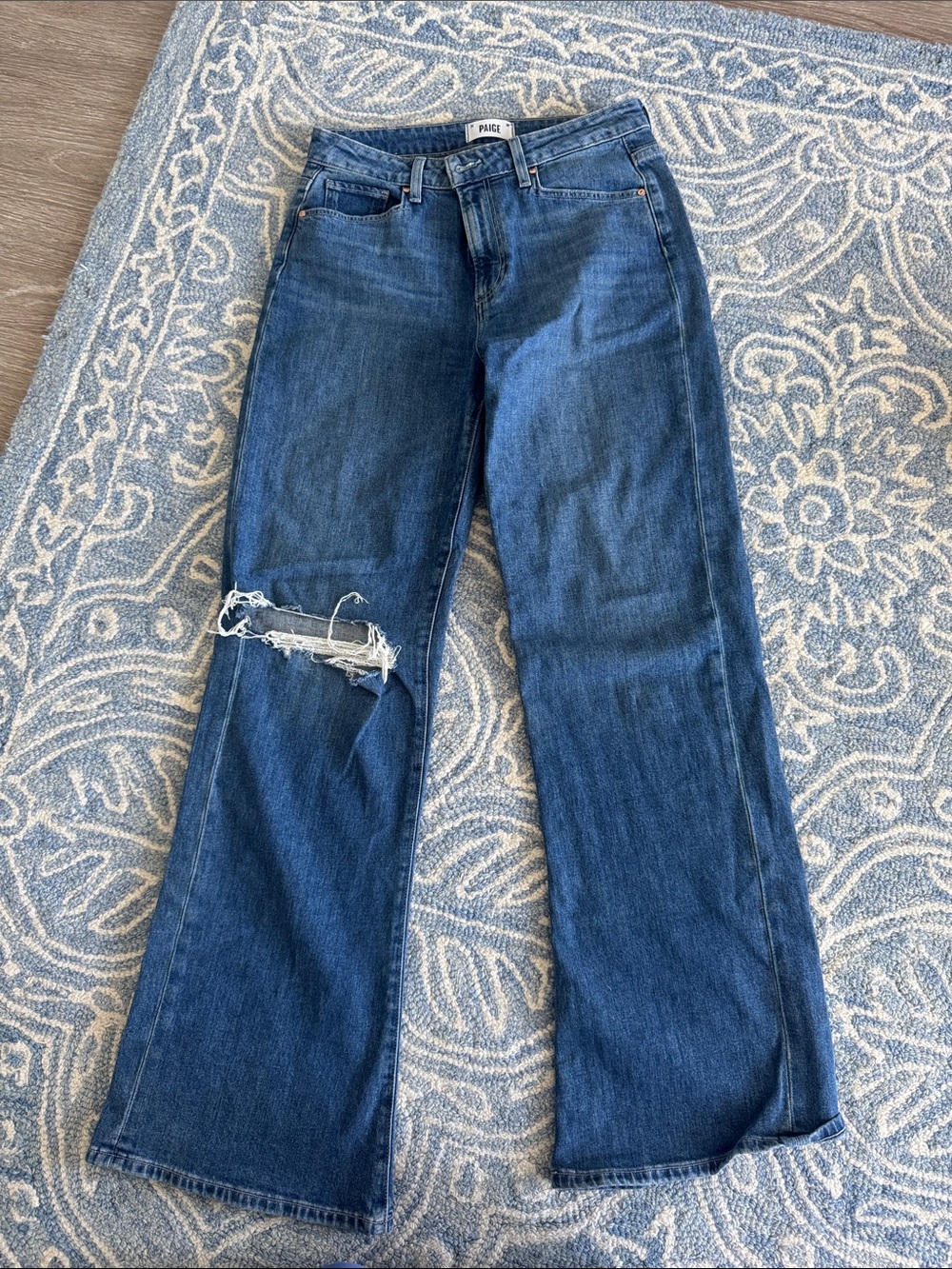 PAIGE Wide Leg Flare Jeans in Dark Blue with Knee Rip